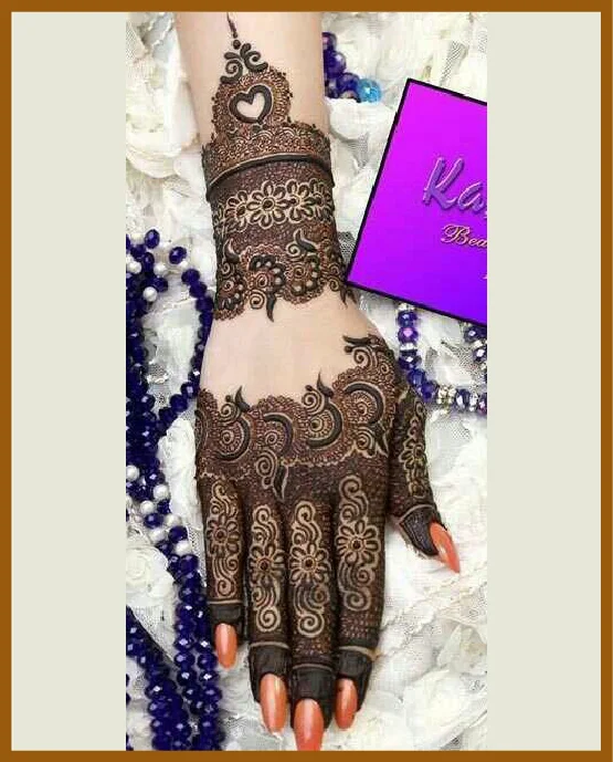 Stylish Back Hand Design With Heart Shaped And Excellent Detailing Stylish Back Hand Mehndi Design